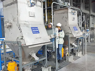 مشروع لـ Shanghai DSM: محطة تفريغ أكياس يدوية عالية الكفاءة 